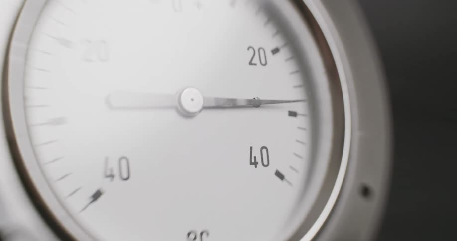 A pressure gauge indicating pressure rapidly rising past its limit