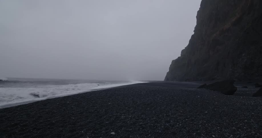 Waves crash on a rocky shore
