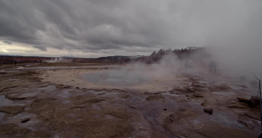 Steaming geyser on a cloudy day