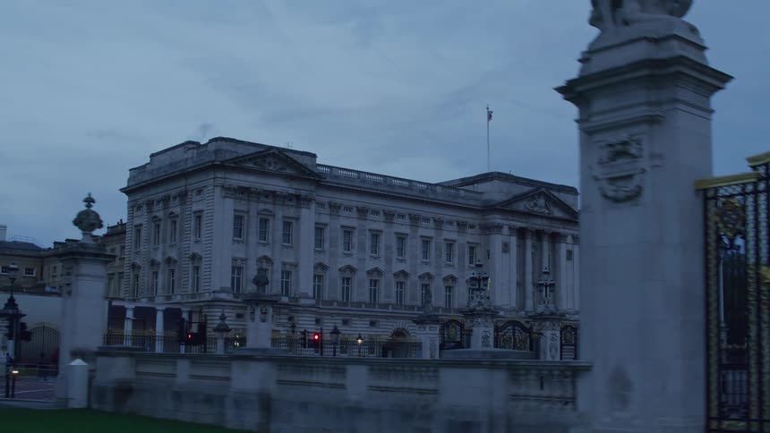 An imposing building with gates in a city
