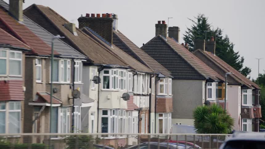 View of a residential neighborhood with townhouses on a cloudy day