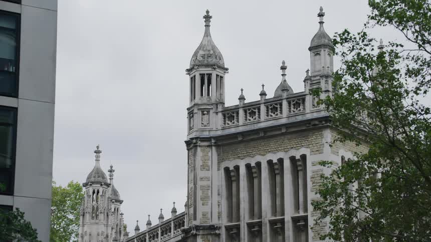 Old gothic architecture building against cloudy sky