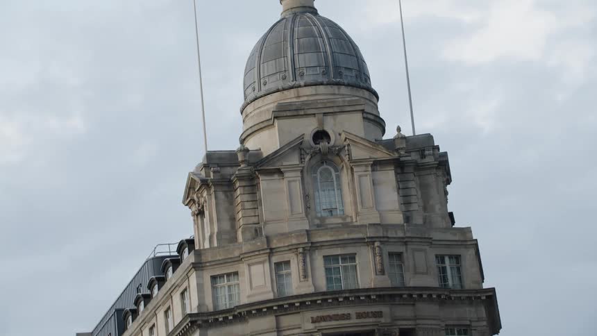 Building with an upper dome in the midst of a metropolis