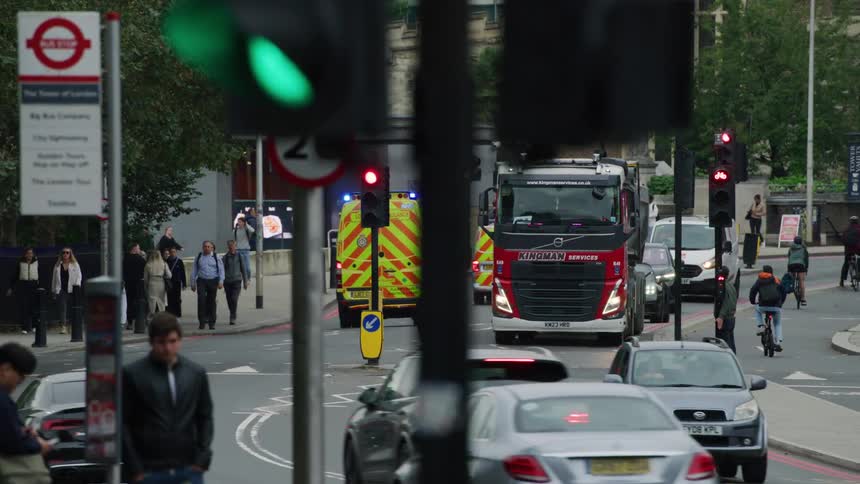 Vehicles on busy london street during the day
