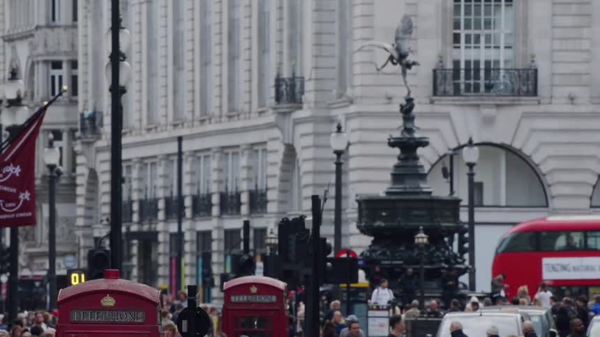 People walk through the city