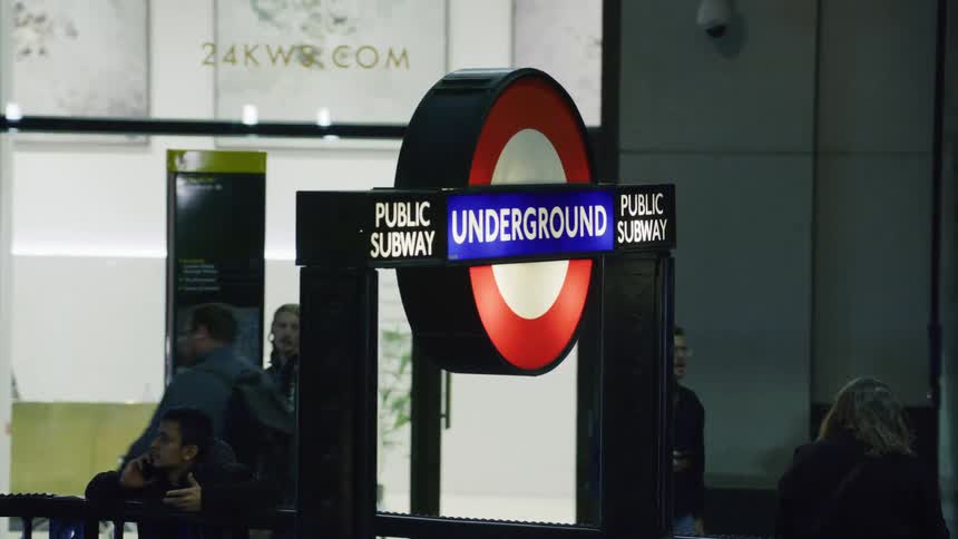 A sign leads to the subway below