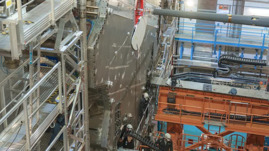 Engineers working on a metal platform