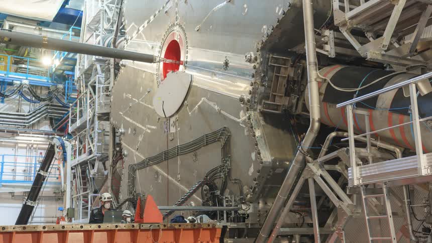 Workers working on a mechanical project inside in a timelapse