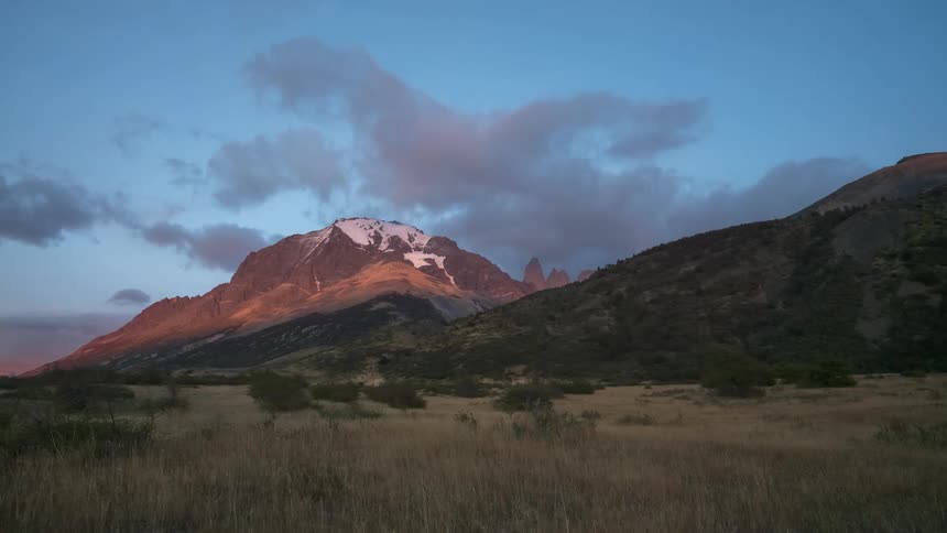 evening light over the mountains in timelapse
