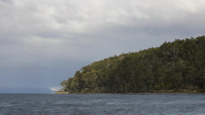 Time lapse overlooking an island on a cloudy day