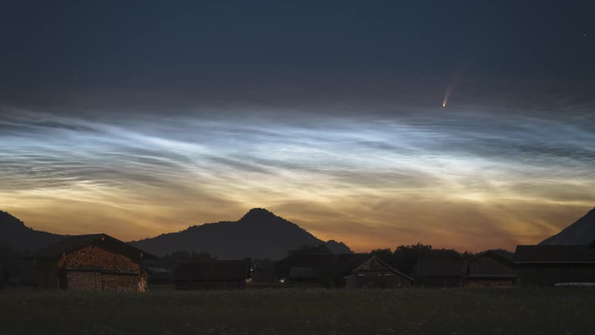 Comet Neowise with strong Noctilucent Clouds (NLC's) above a rural mountain area