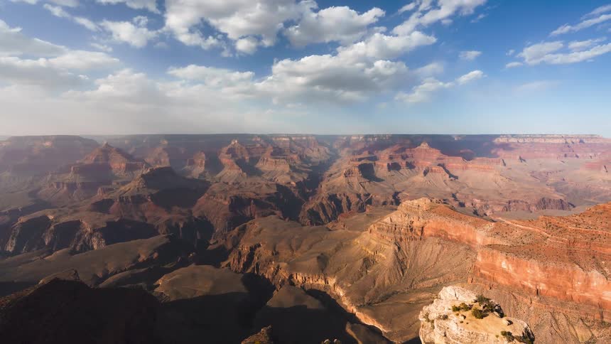 Clouds flow over the canyon