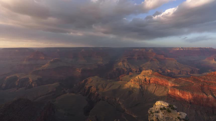Clouds fly over the large canyon
