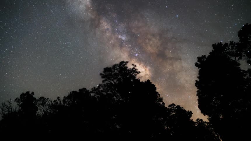 The milky way galaxy moves across the night sky
