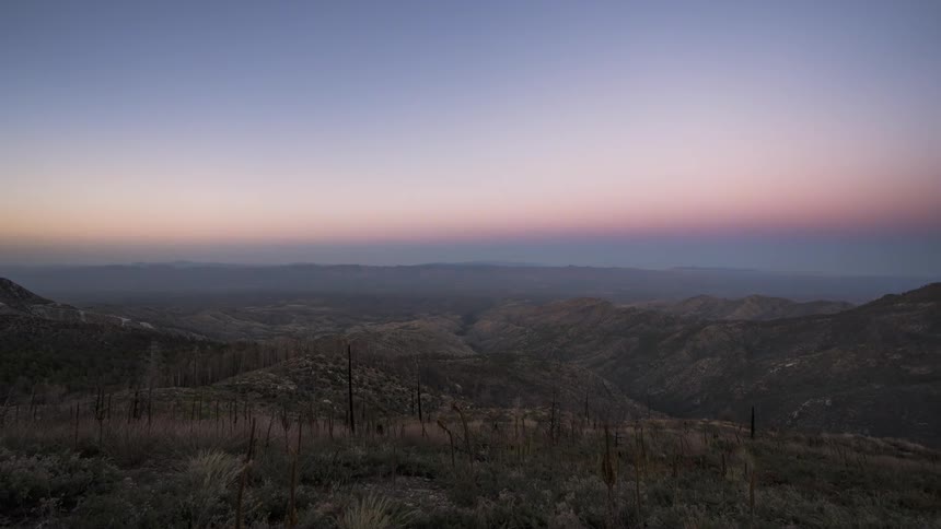 Shadows engulf a canyon