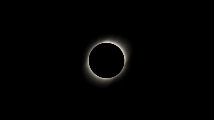 The moon passes in front of the sun during a total solar eclipse