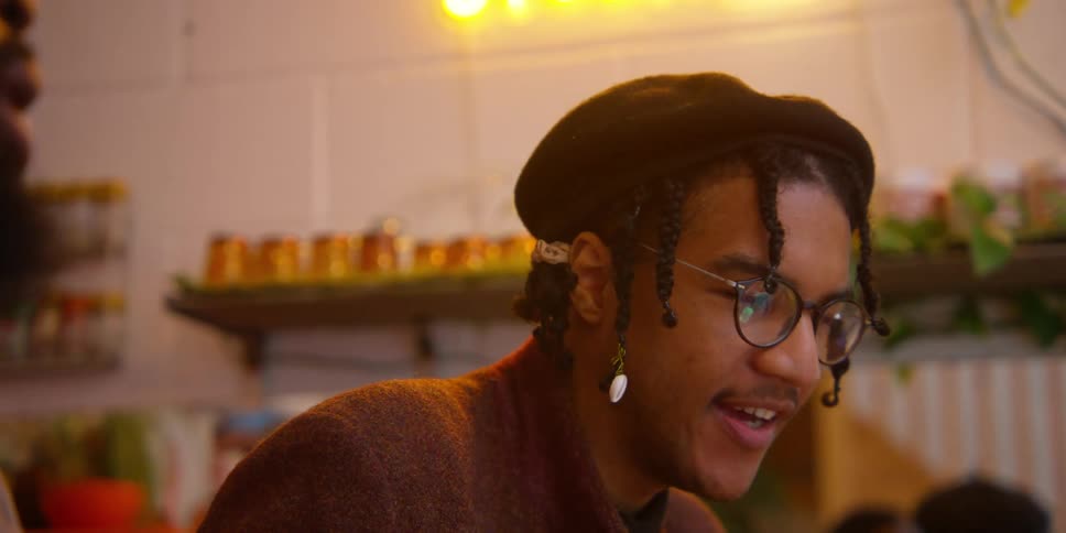 Two people talking in a room together