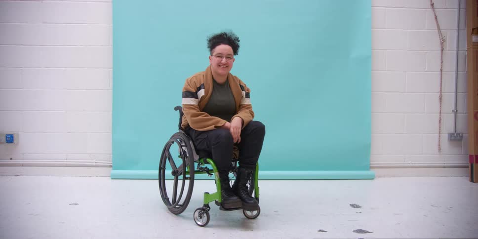 A model in wheelchair spins around