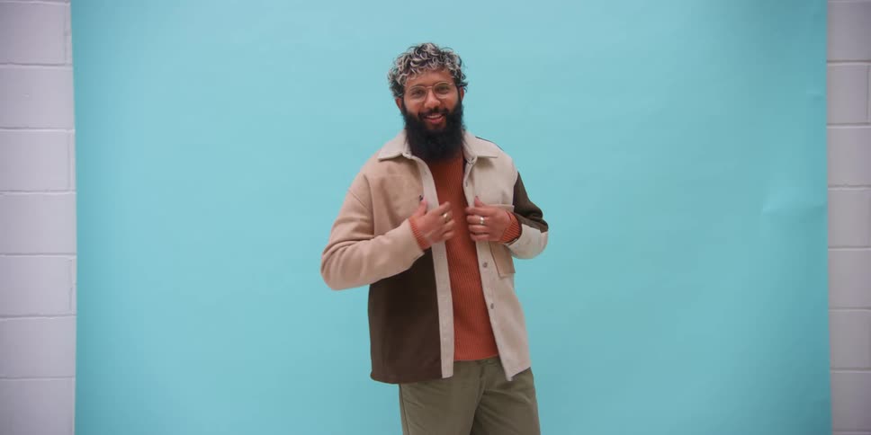 A man posing for a fashion shoot