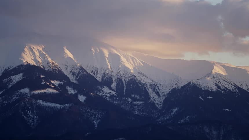 A mountain range covered in snow