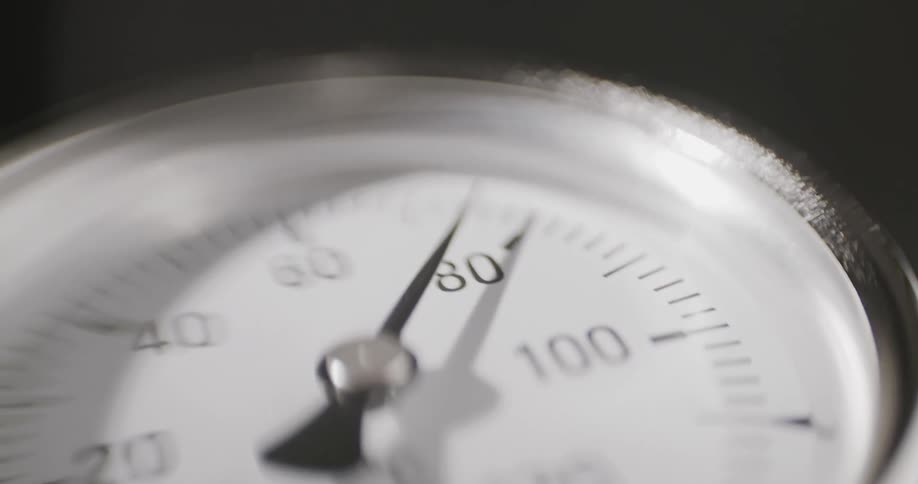 The needle on a speedometer moves quickly upwards