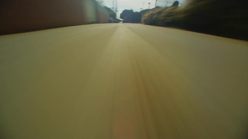 The asphalt of a deserted street in a neighborhood
