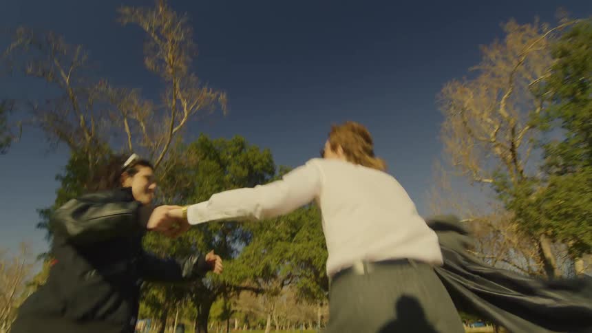 A clip of a couple running in the bush