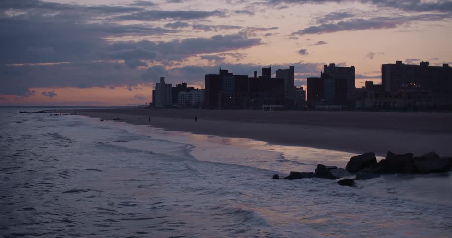 An urban beach at sunset