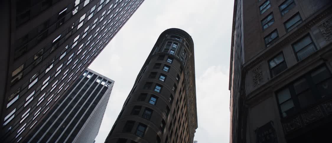 City downtown buildings contrast with overcast sky