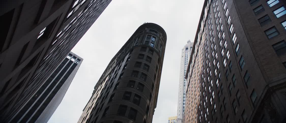 Upward view of huge buildings in the middle of a metropolis