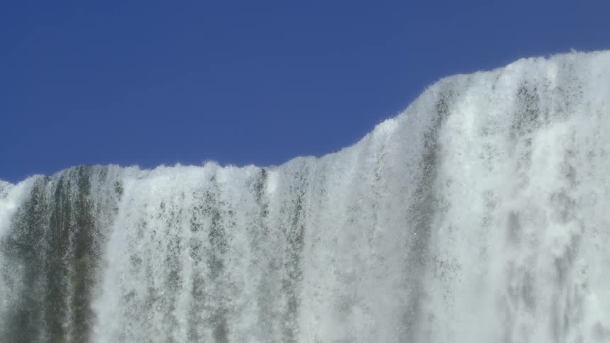 Top of a waterfall on a sunny day