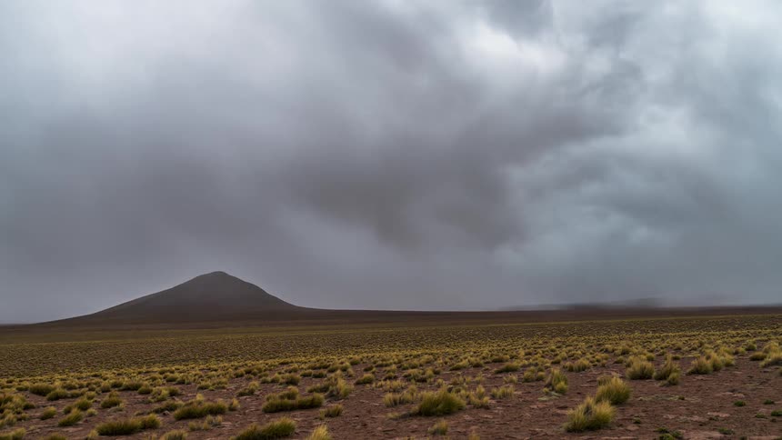 Cloud movement time lapse over desert landscape