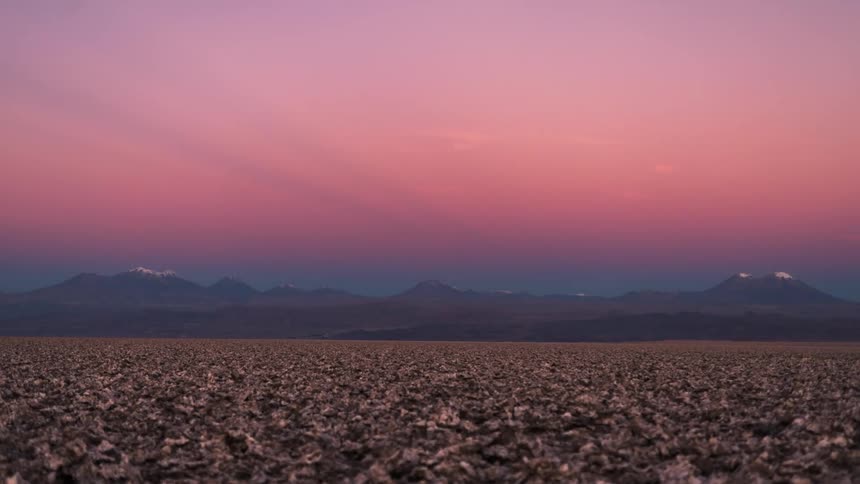 Mountain landscape with a darkening day in timelapse