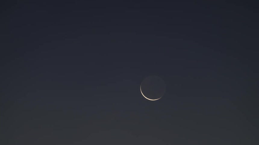 Crescent moon setting