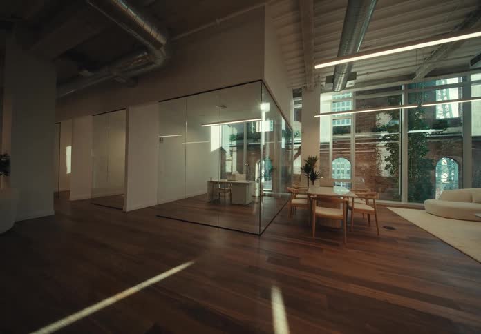 A view of the inside of an office int he middle of a day