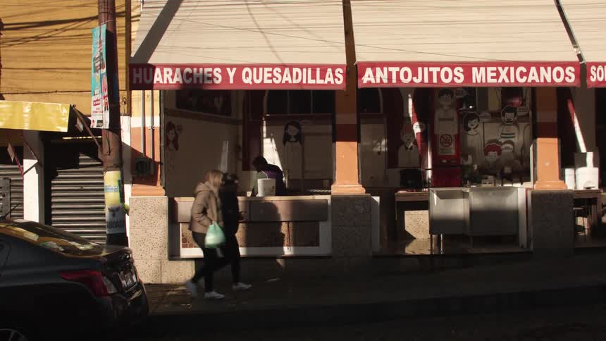 Faade of a snack bar in the middle of a city
