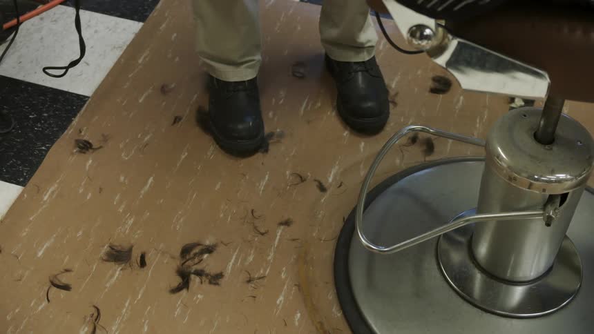 Hair on the floor of a barber shop