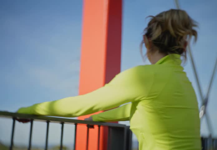 A woman screams from a bridge