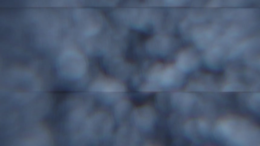 A pixelated and distorted visual effect creating an abstract pattern of colors and shapes