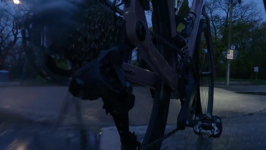 A man is walking his bike