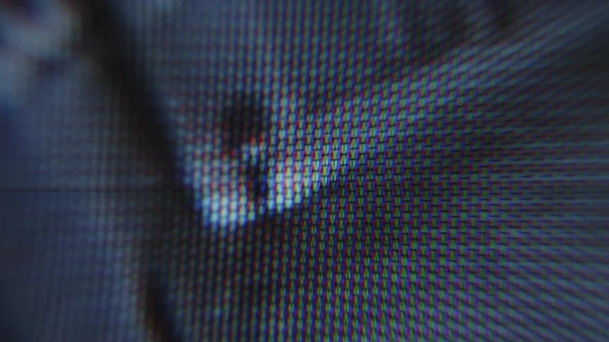 A person rides down the alley on the cctv footage