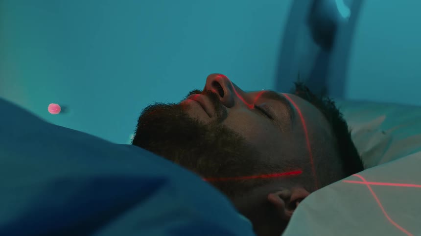 A man is getting a ct scan