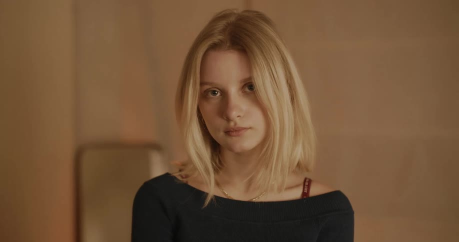 A girl is staring forward
