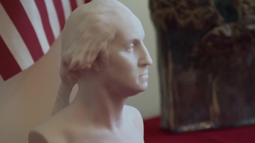 White solid sculpture on a table