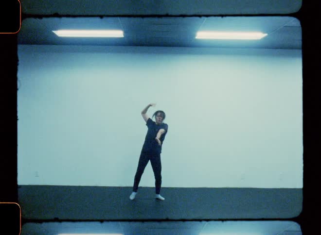 Dancer performing in an indoor studio