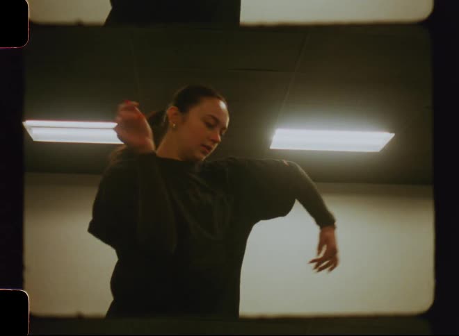 A young dancer performing solo