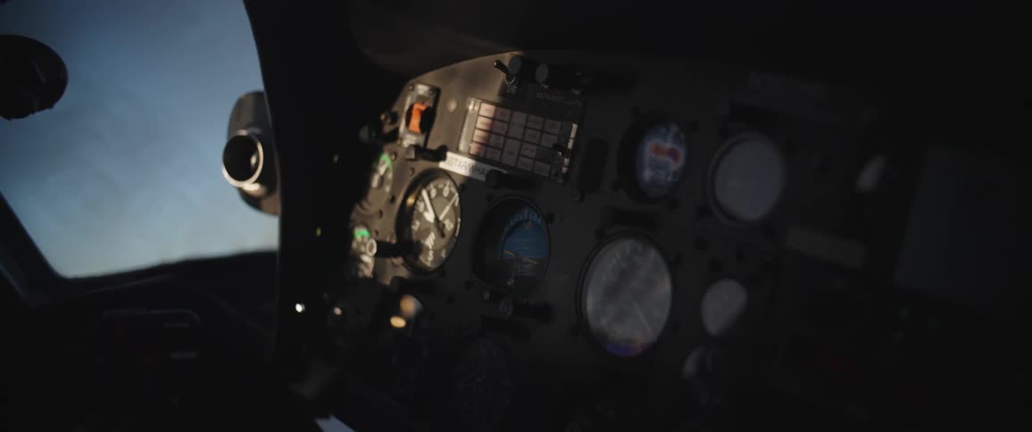 Closeup of the instrument panel of a small plane in midair