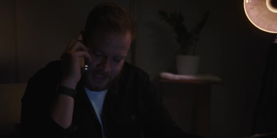 A person making a phone converstion