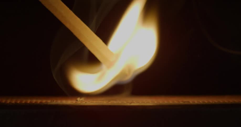 A matchstick is lit