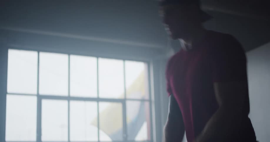 Man performing squats with weight